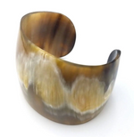 Load image into Gallery viewer, A brown horn cuff bracelet with a unique natural finish.